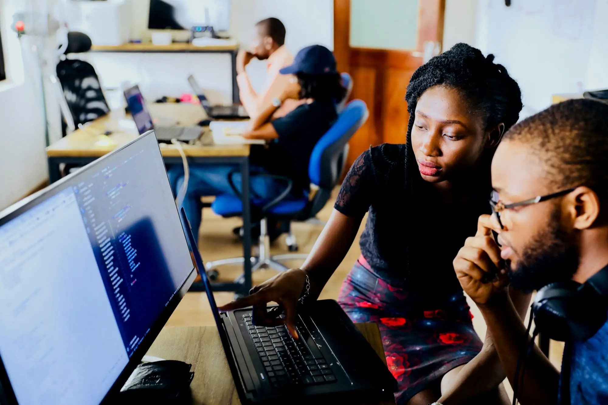 Two engineers going through a customer environment together